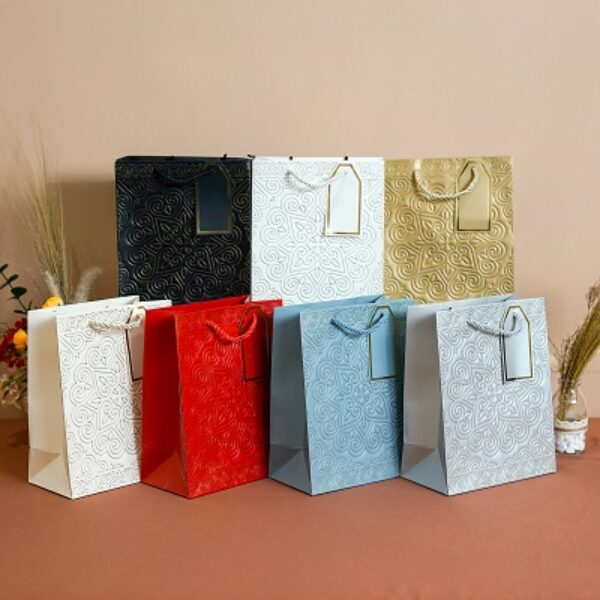 Paper Bag Emboss Ornamen Ulang Abu