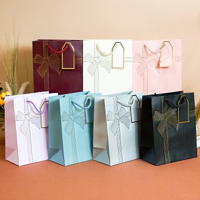 Paper Bag Pita Emas Emboss Cream